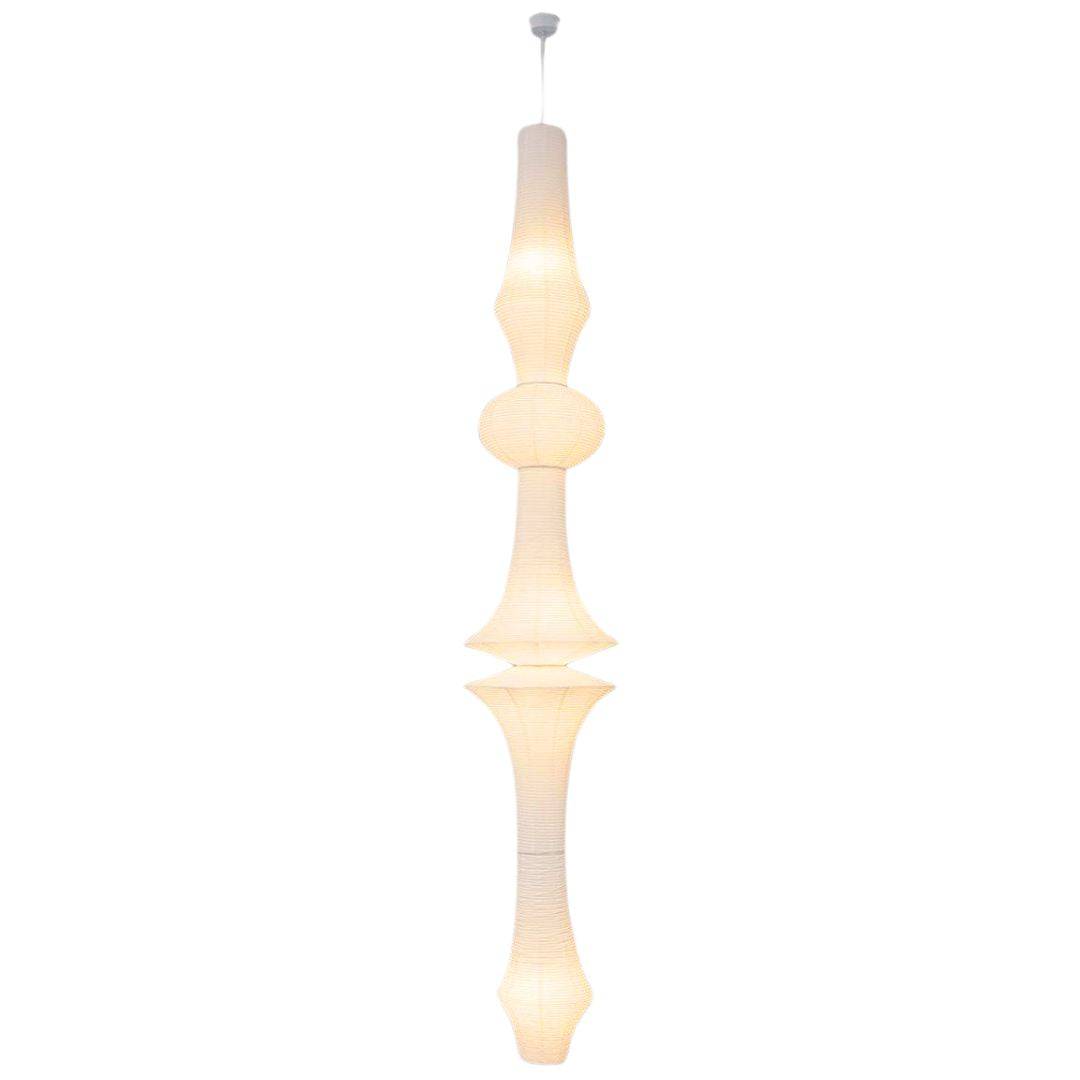 Extra-long Japanese paper lantern pendant light with Noguchi-inspired design. Large rice paper lamp featuring an off-white shade, ideal for high-ceiling spaces. Modern paper lantern light for creating a warm, elegant atmosphere.